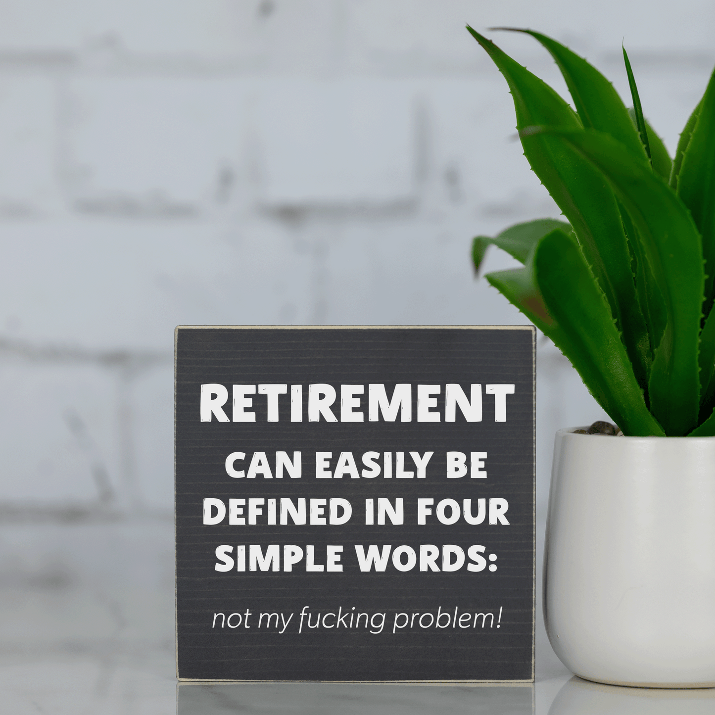 retirement can be easily defined in four simple words : not my f*cking problem! ~ wood sign block