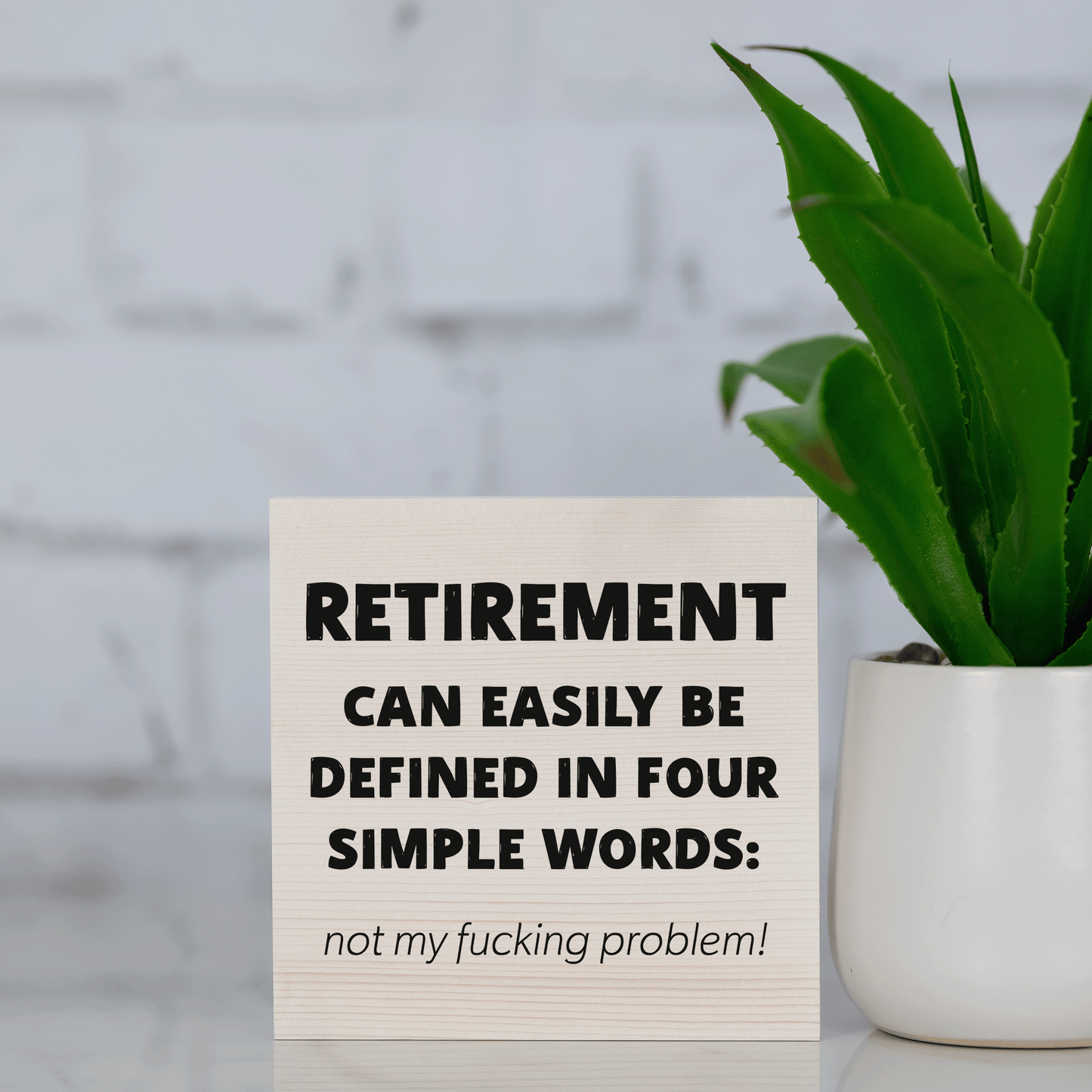 retirement can be easily defined in four simple words : not my f*cking problem! ~ wood sign block