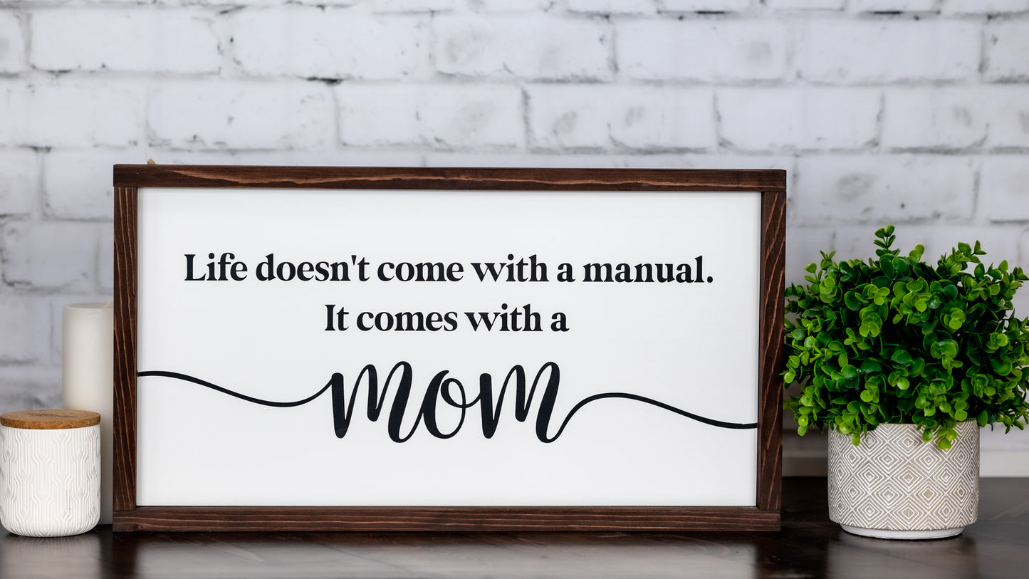life doesn't come with a manual. it comes with a mom ~ wood sign