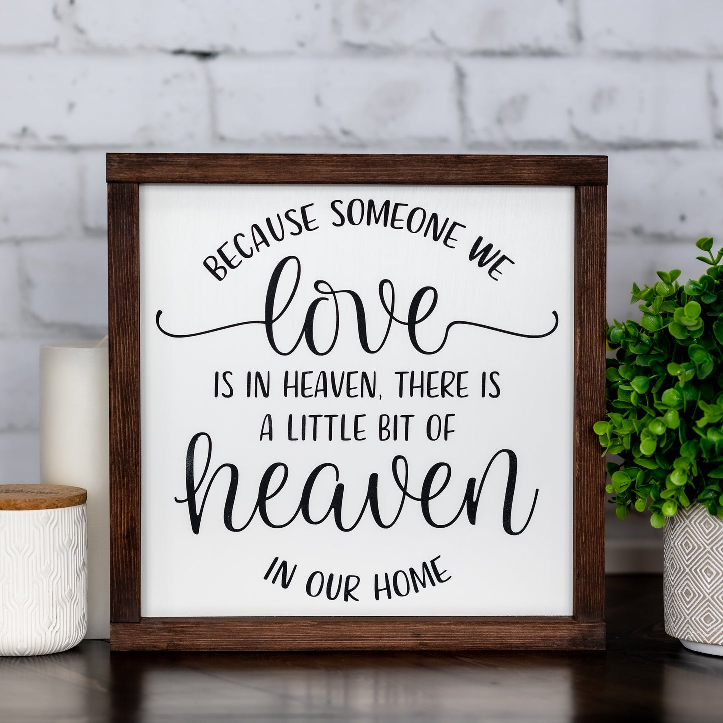 because someone we love is in heaven, there is a little bit of heaven in our home ~ wood sign