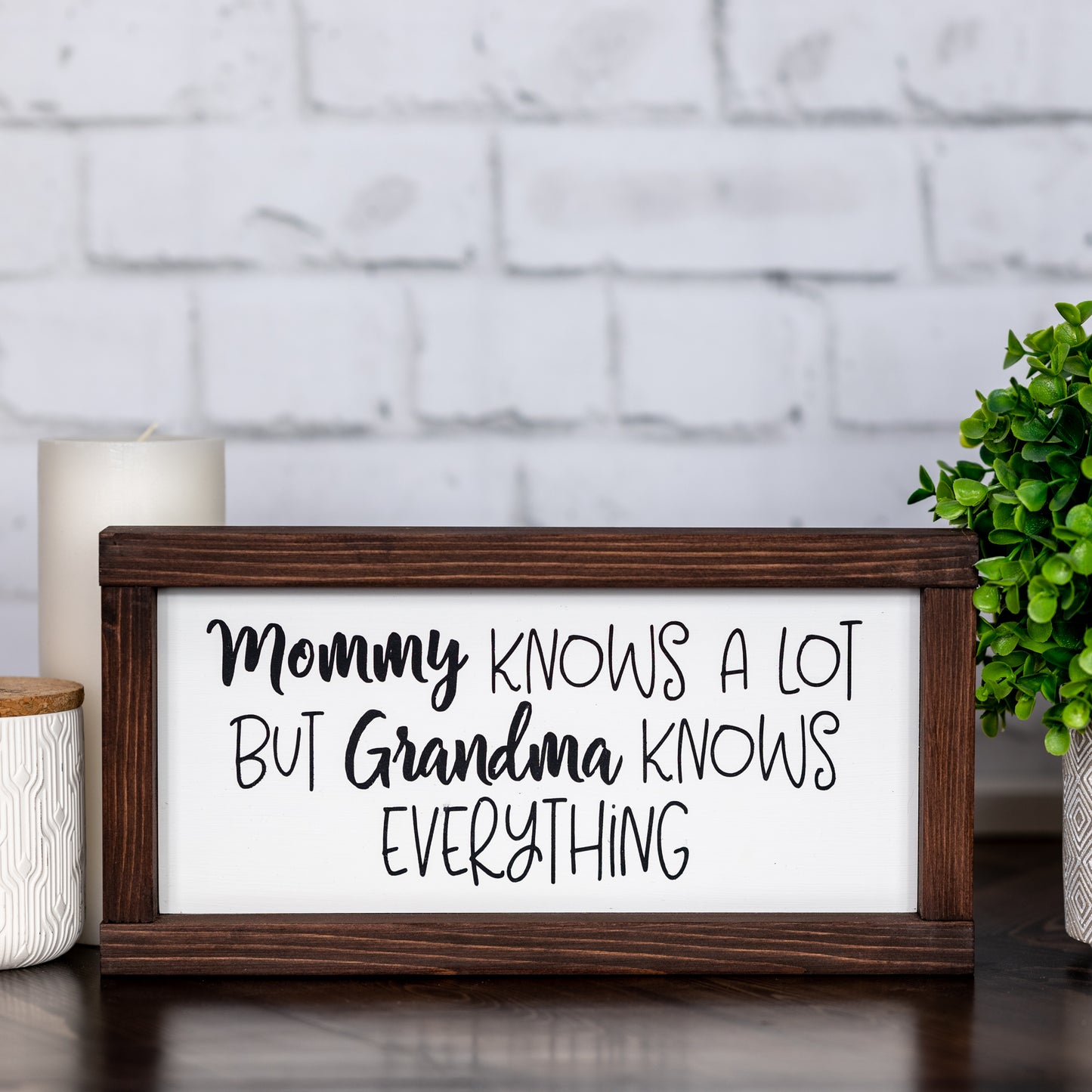mommy knows a lot but grandma knows everything ~ wood sign
