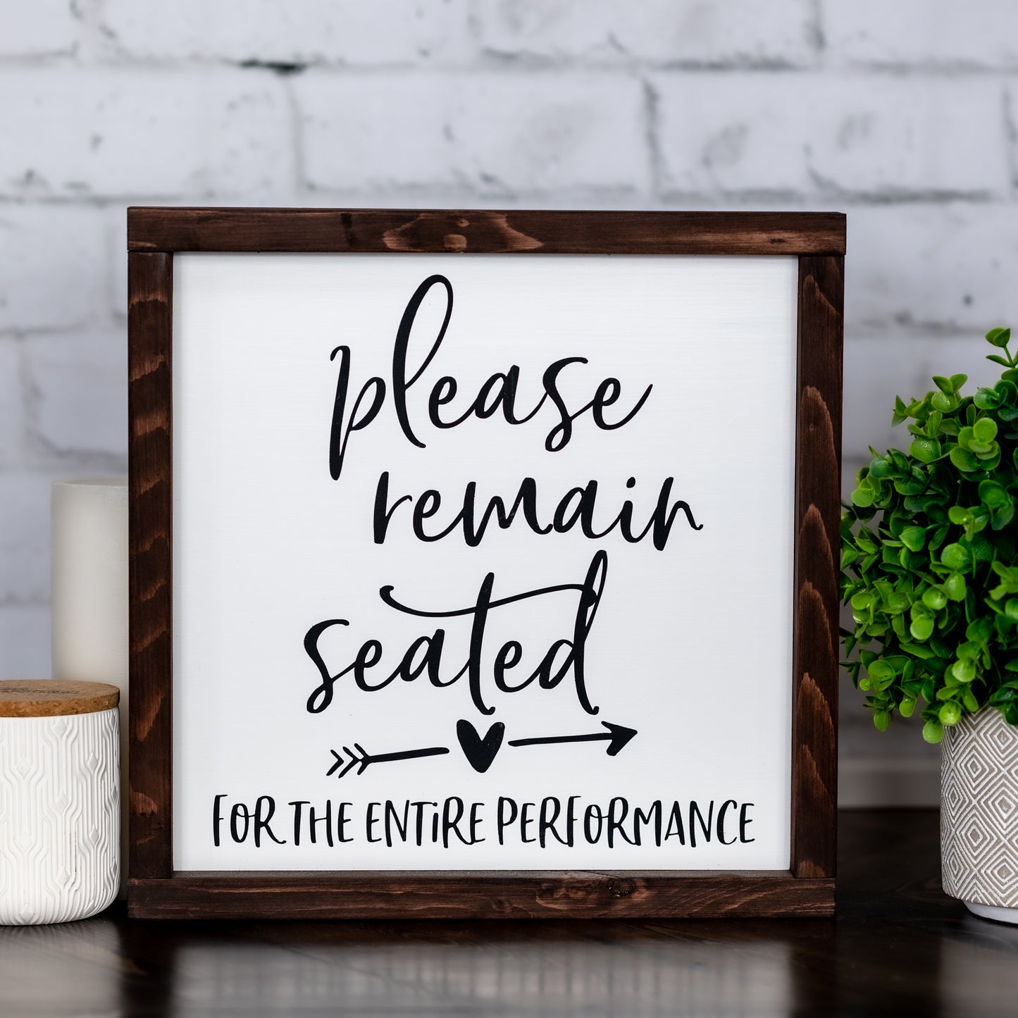 please remain seated for the entire performance  ~ wood sign