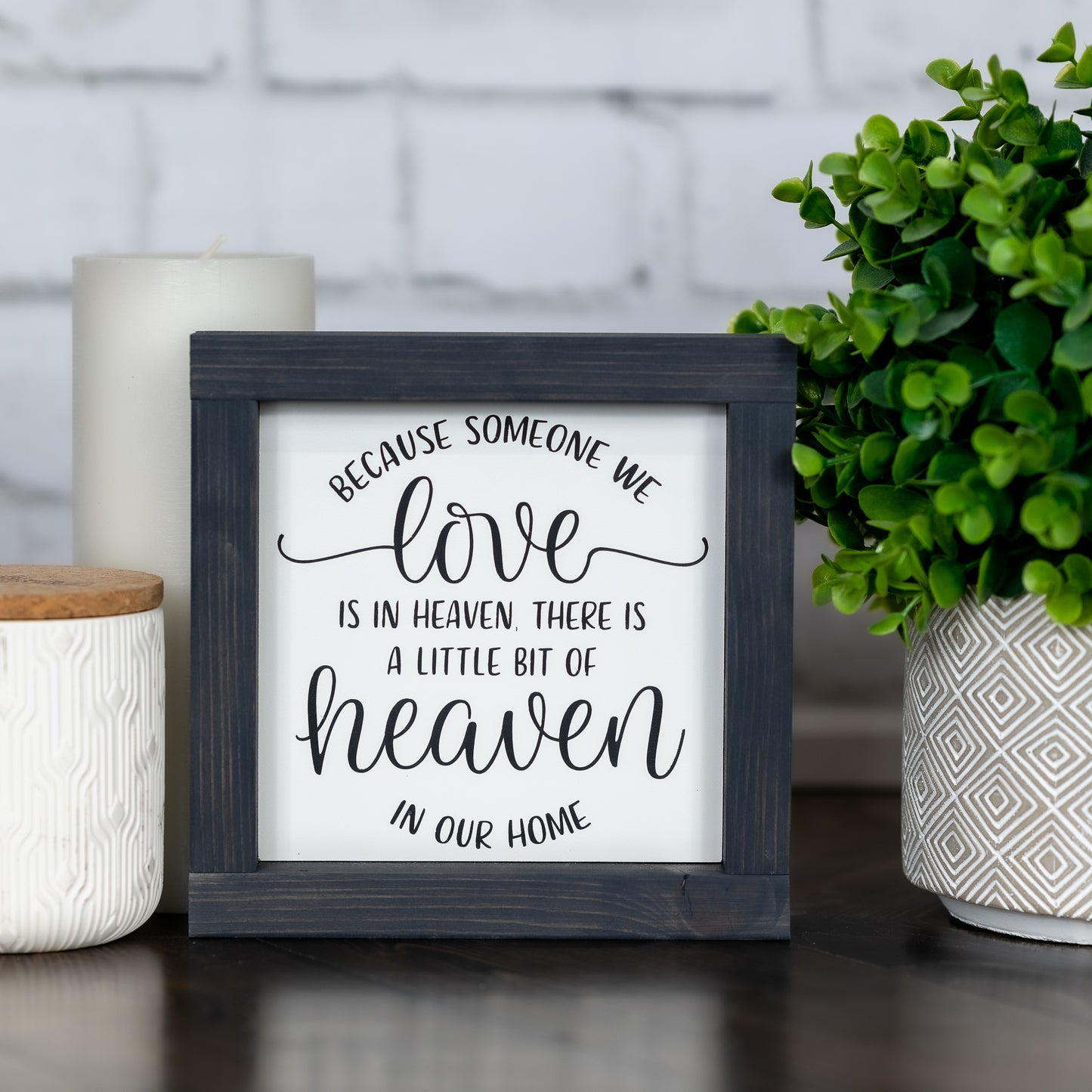 because someone we love is in heaven, there is a little bit of heaven in our home ~ wood sign