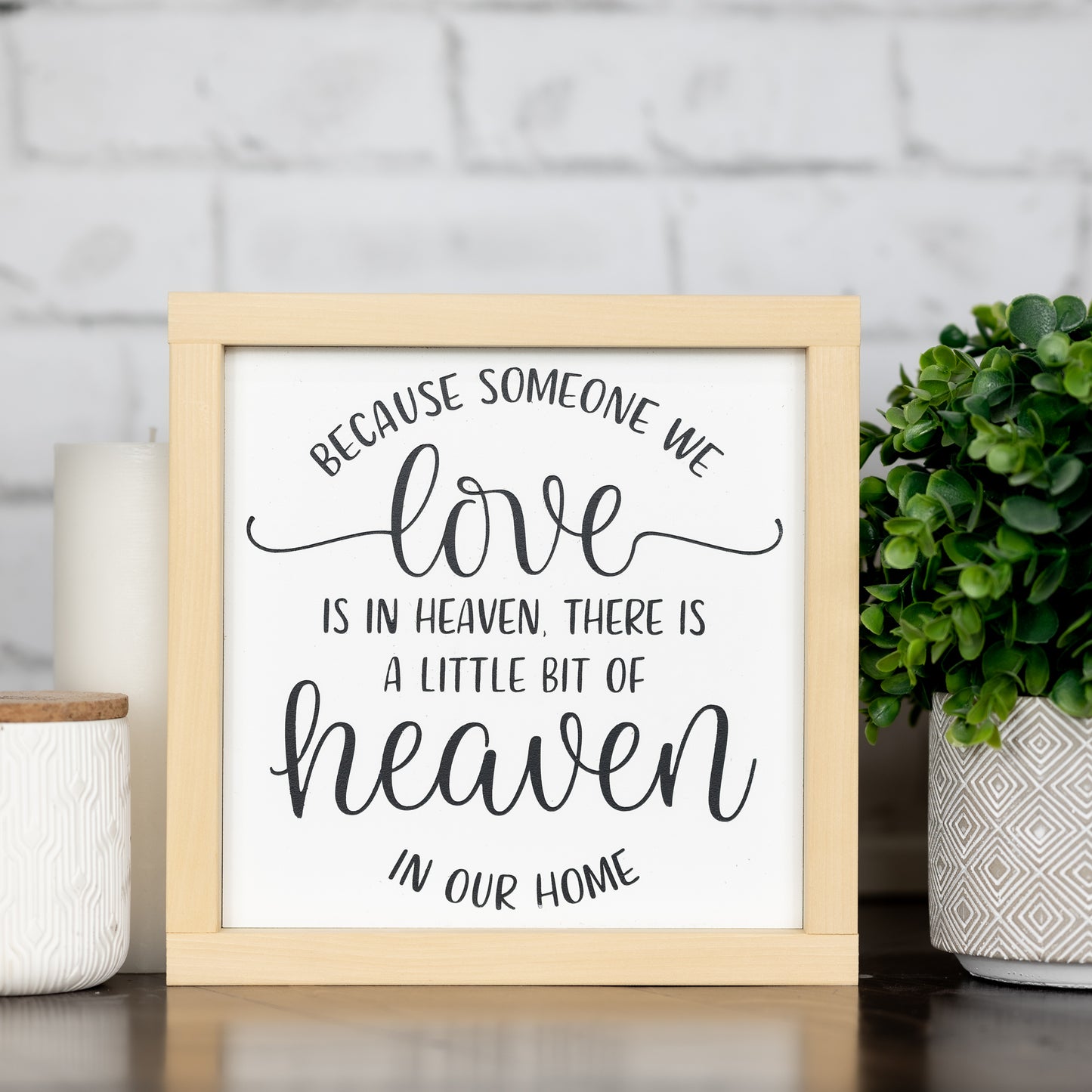 because someone we love is in heaven, there is a little bit of heaven in our home ~ wood sign