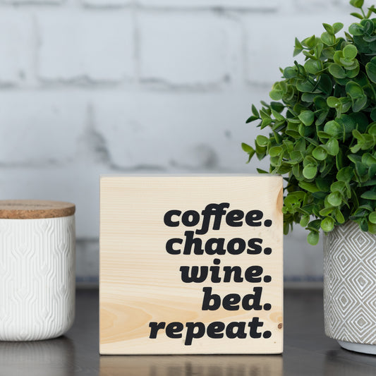 coffee. chaos. wine. bed. repeat. ~ block sign