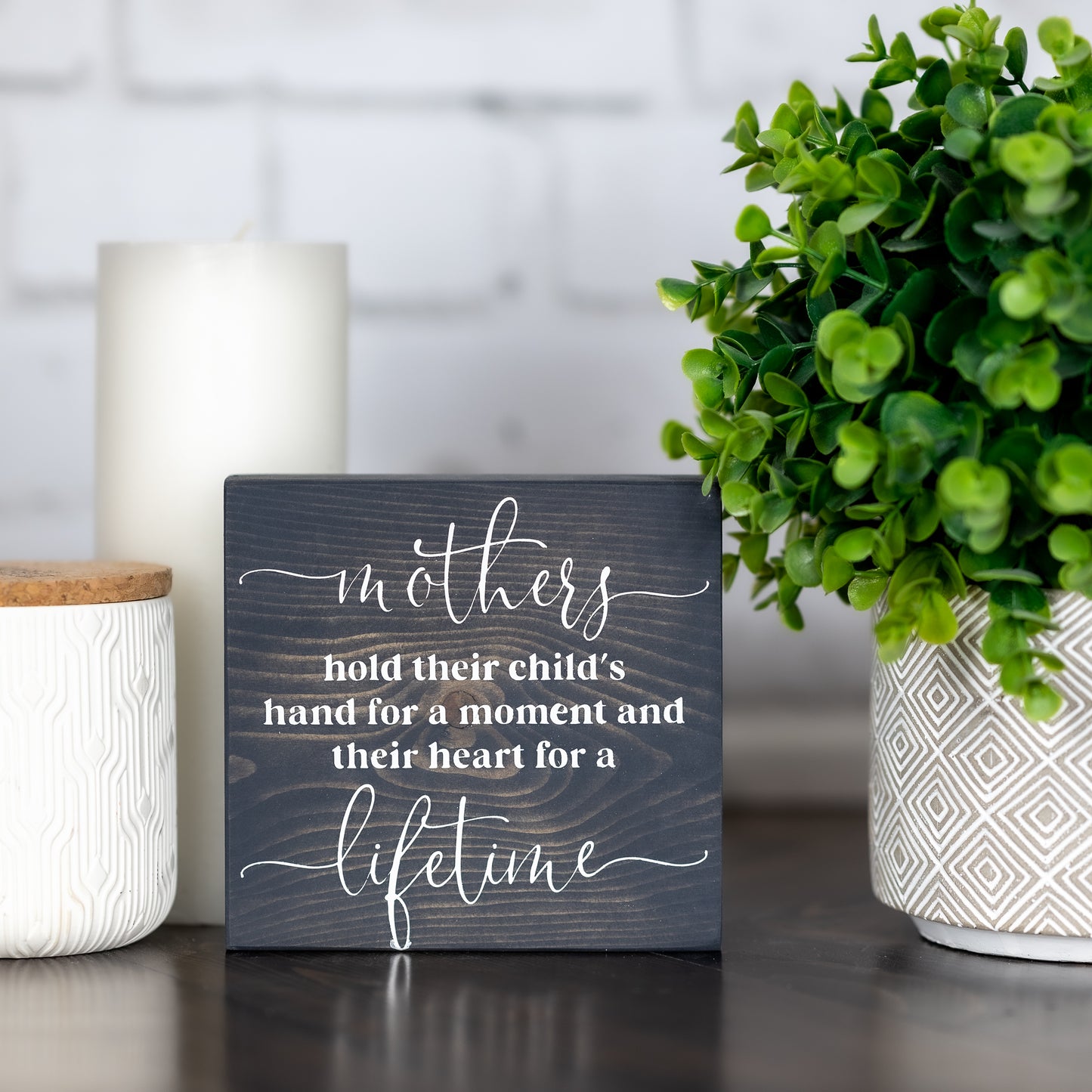 mothers hold their child's hand for a moment and their heart for a lifetime ~ shelf block sign