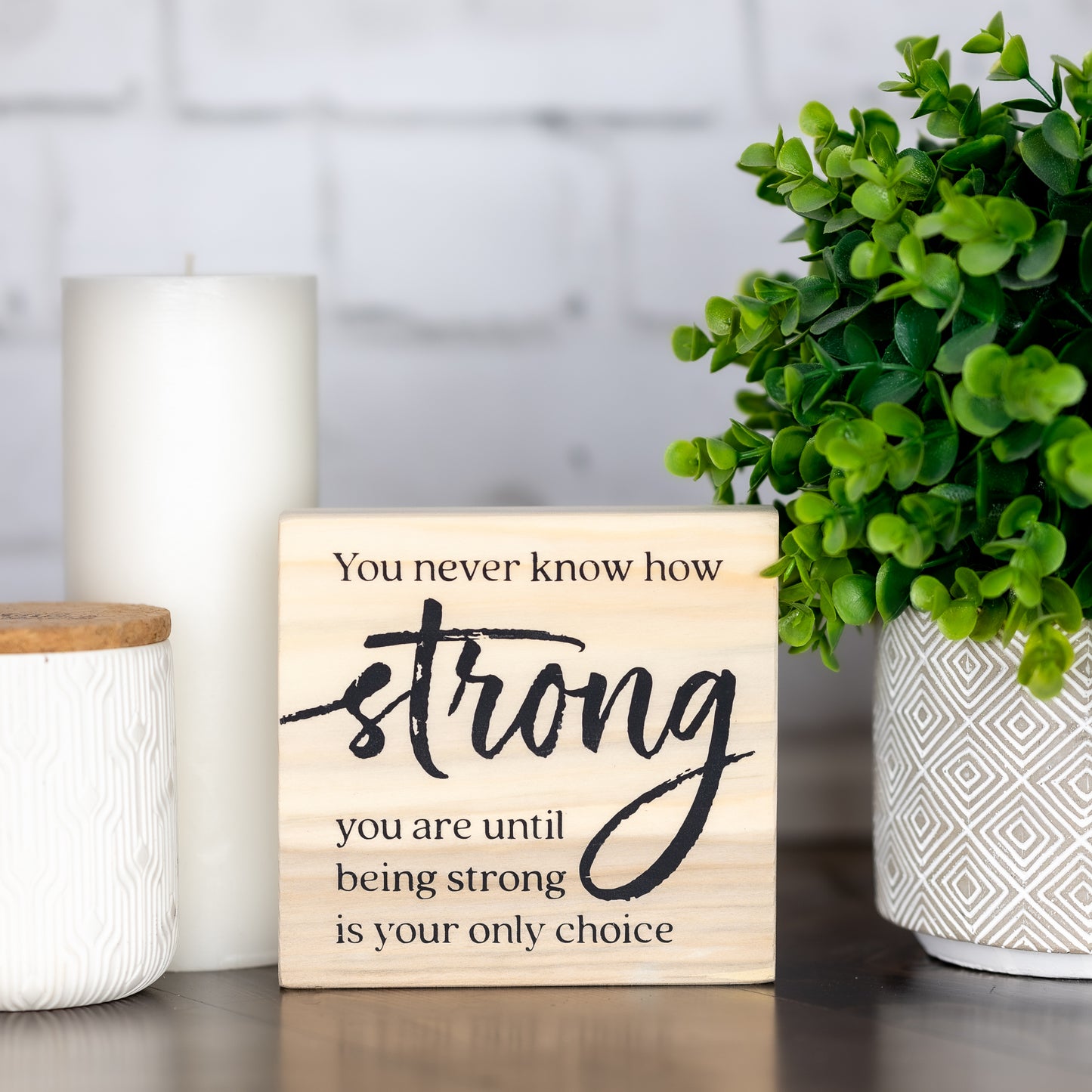 you never know how strong you are until being strong is your only choice ~ shelf block sign